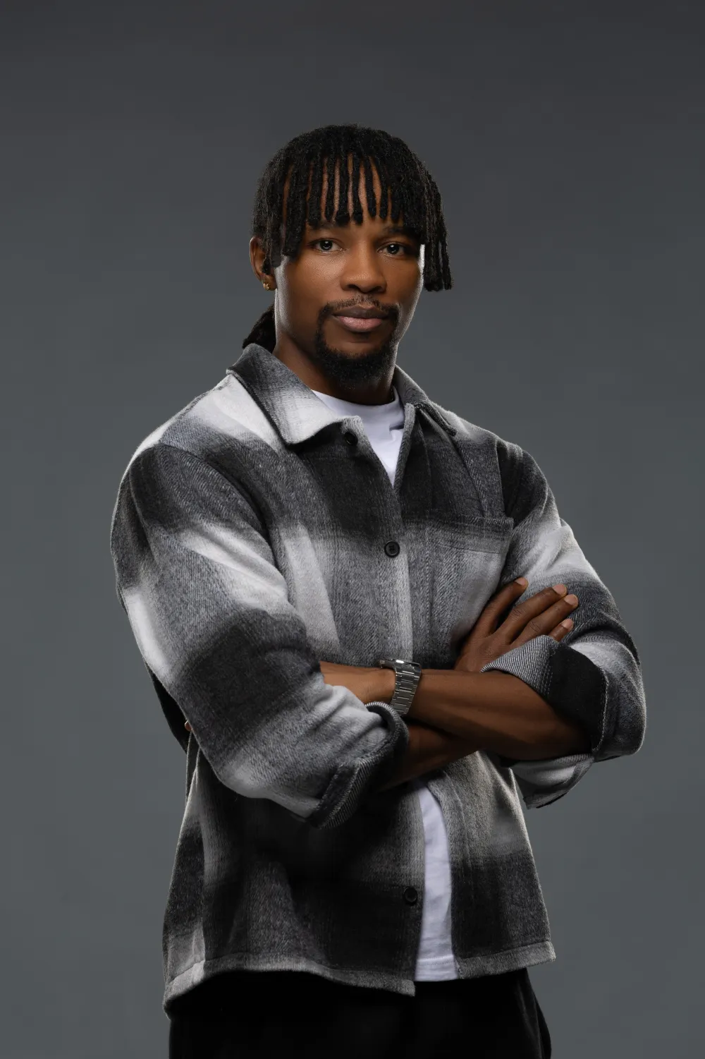 Ekene Eze in a checked overshirt